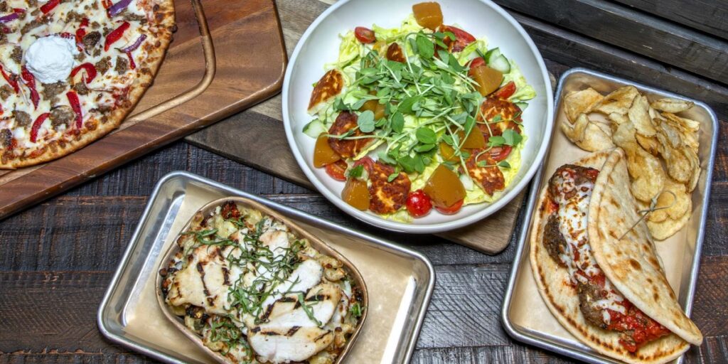 Table full of Crust and Copper menu items