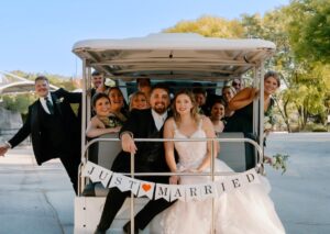 Wedding party sitting on the Zoo Expeditions vehicle