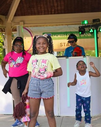 Children dancing on a stage