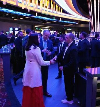 Group of executives mingling at Potawatomi Casino